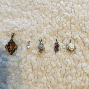Collection of vintage sterling silver pendants